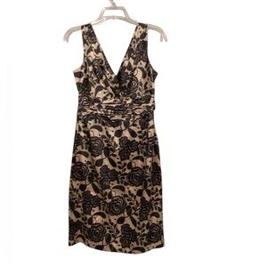 Jones wear black and gold dress size 8 with zip up back and band detail.